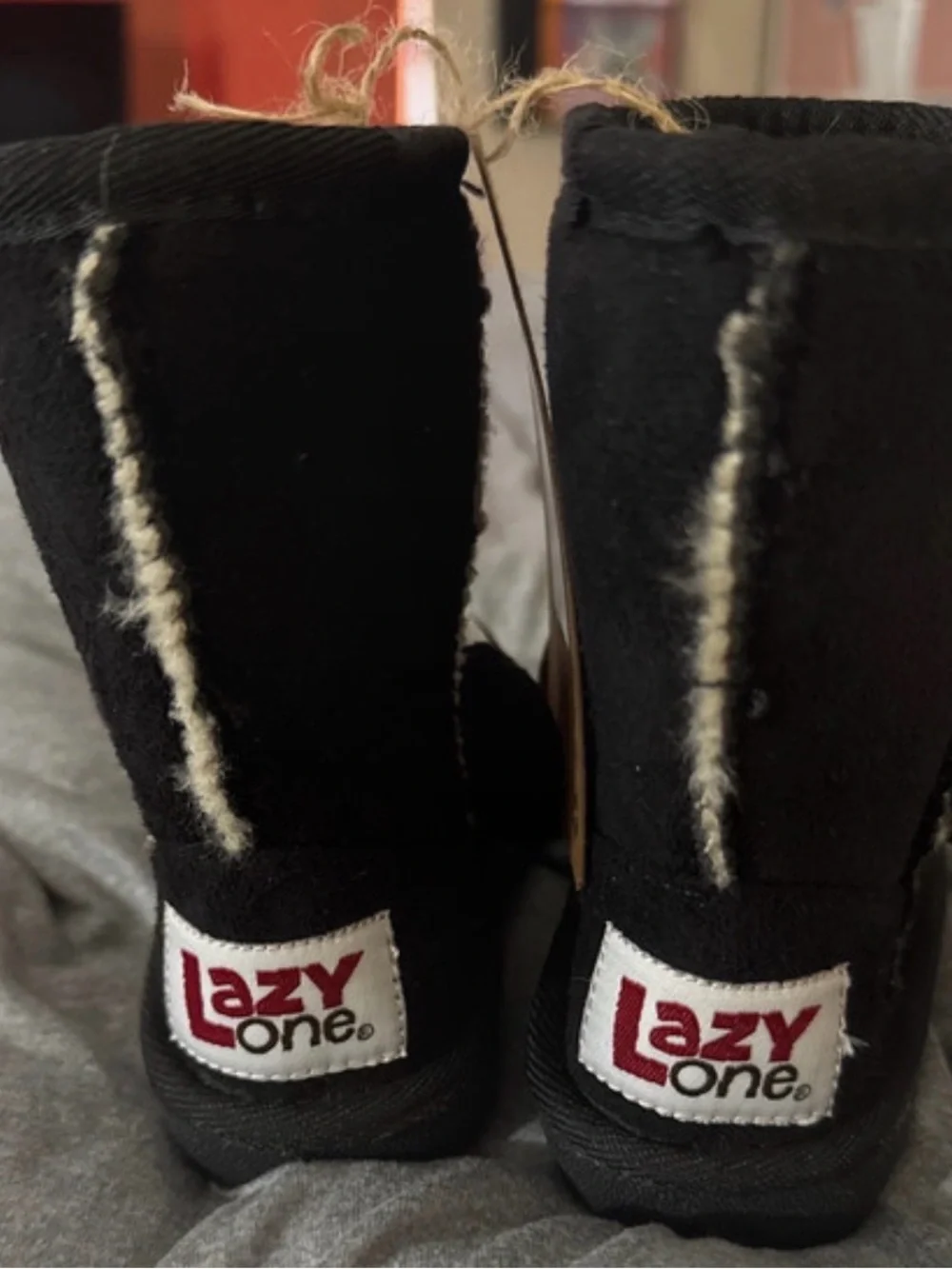 Lazy One Black Plush Boot Slippers with Tan Stitching